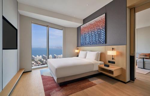 Suite Familiar, 1 Cama King, Vistas al Mar del hotel Hyatt Place Yantai Development Zone. Foto 3
