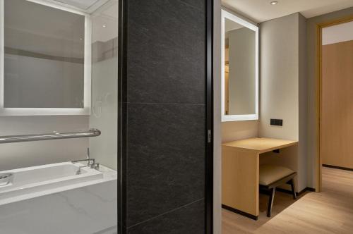 Suite Familiar, 2 Camas Individuales, Vistas al Mar del hotel Hyatt Place Yantai Development Zone. Foto 4