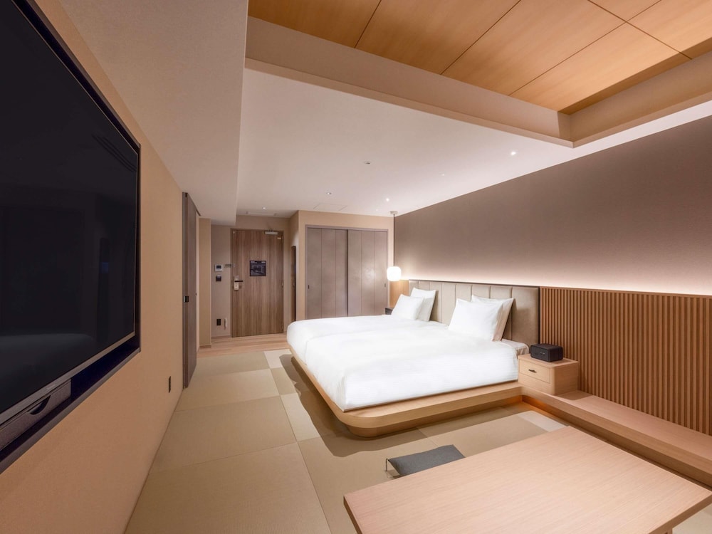 Suite Ejecutiva Japonesa Tatami con 2 camas individuales, bañera, Acceso al Salón del hotel Novotel Nara