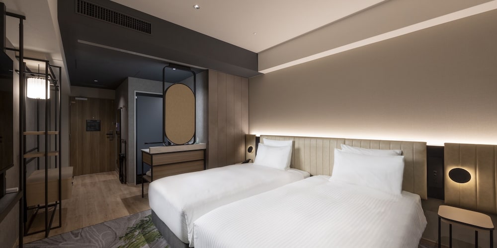 Habitación Estándar con 2 camas individuales, ducha del hotel Novotel Nara. Foto 2