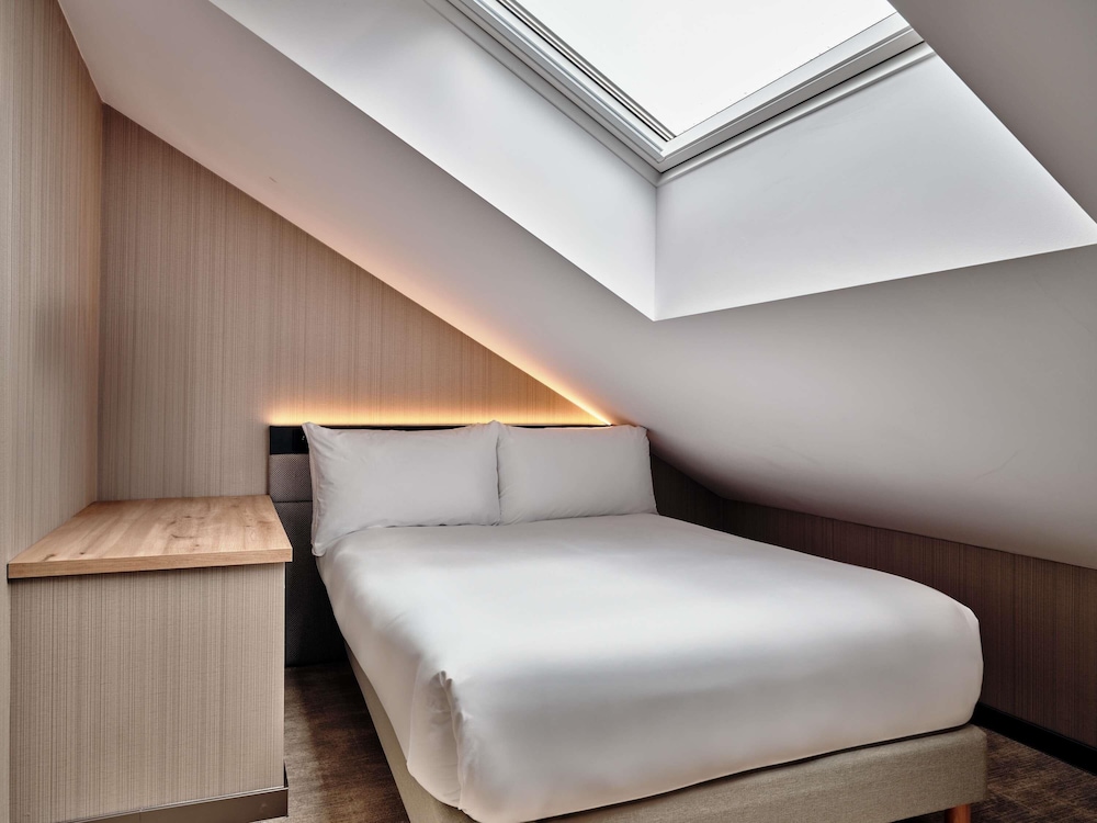 Habitación Deluxe, varias camas del hotel Mövenpick Resort & Spa Karpacz. Foto 3