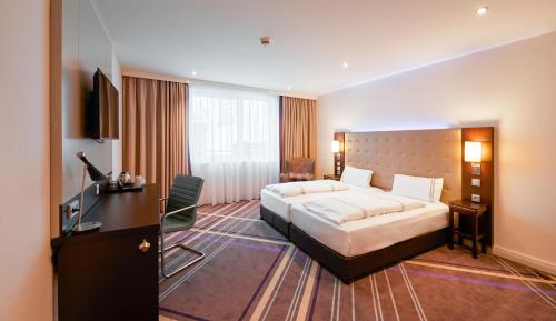 Habitación Doble adaptada para personas con movilidad reducida del hotel Premier Inn München City Zentrum. Foto 5