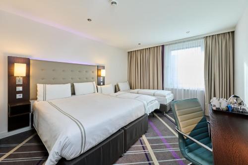 Habitación Cuádruple Estándar del hotel Premier Inn München City Zentrum. Foto 4