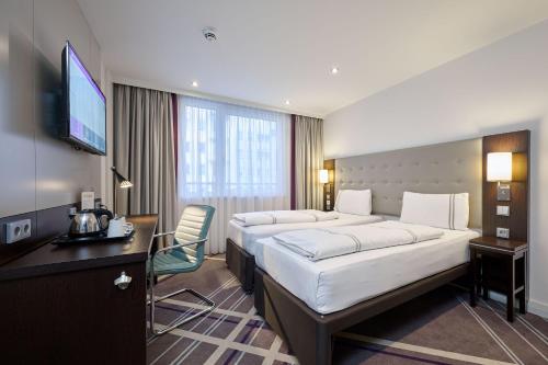 Habitación Doble Estándar - 1 o 2 camas del hotel Premier Inn München City Zentrum. Foto 10