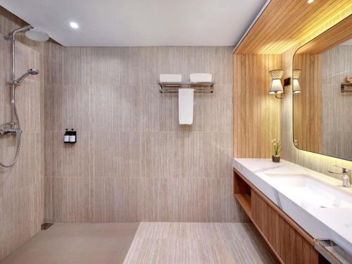 Habitación Doble Deluxe (2 camas) del hotel Mercure Pangkalan Bun. Foto 2