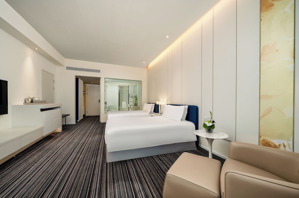 Habitación Ejecutiva, Acceso al salón, 2 camas dobles del hotel Grand Mercure Shanghai Century Park