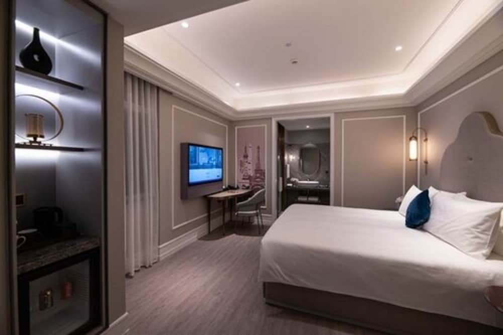 Habitación Superior con cama king size del hotel Mercure Shanghai Yu Garden On The Bund. Foto 6