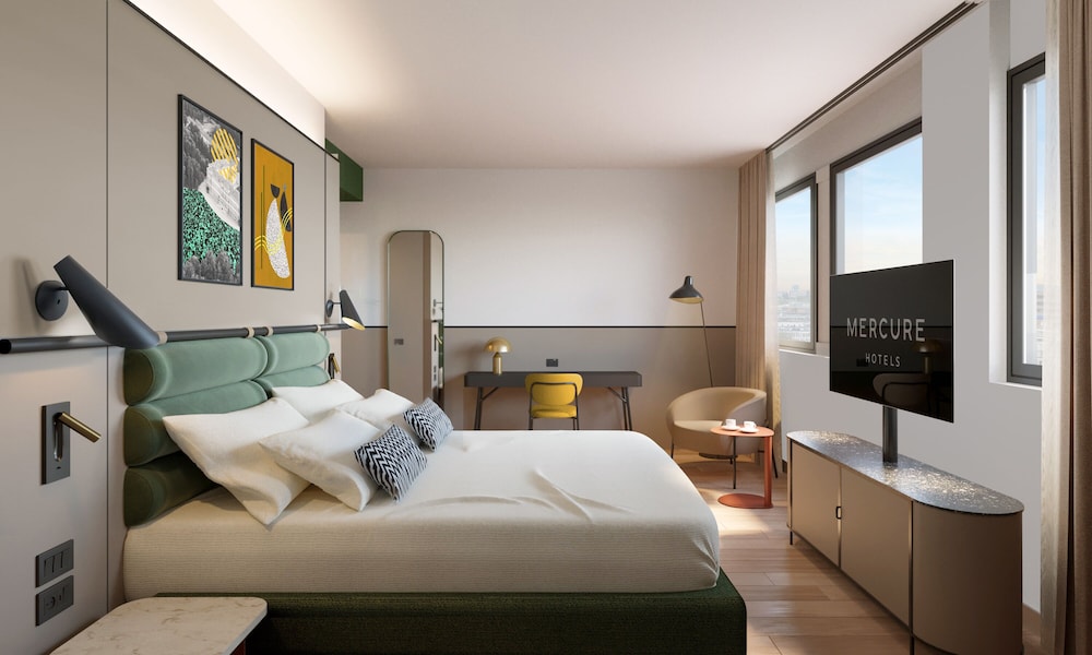 HABITACIÓN ECONÓMICA CON CAMA DOBLE Y BAÑO PARA HUÉSPEDES CON MOVILIDAD REDUCIDA del hotel Mercure Milano Agrate Brianza. Foto 1