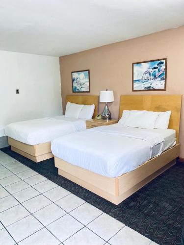 Habitación Doble - 2 camas dobles del hotel Tides Motor Inn