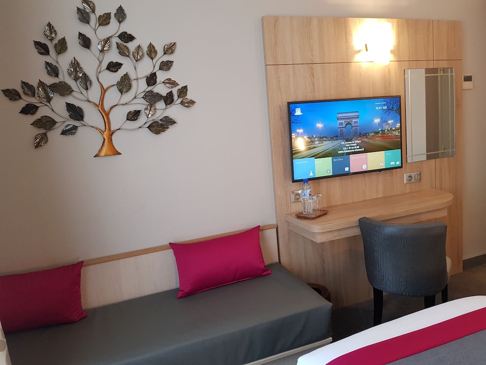 Habitación superior con 2 camas individuales del hotel CHAMPERRET ELYSEES. Foto 2