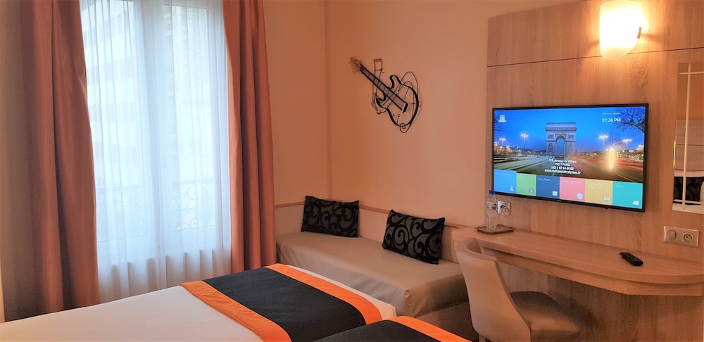 Habitación superior con 2 camas individuales del hotel CHAMPERRET ELYSEES. Foto 5