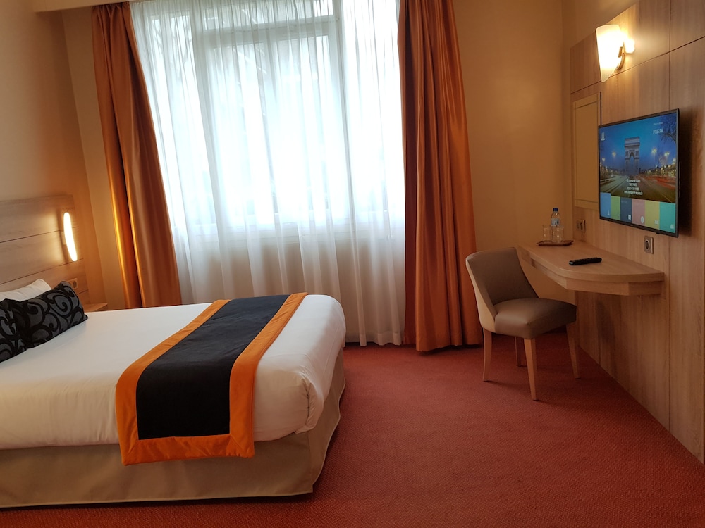Habitación doble superior del hotel CHAMPERRET ELYSEES. Foto 9