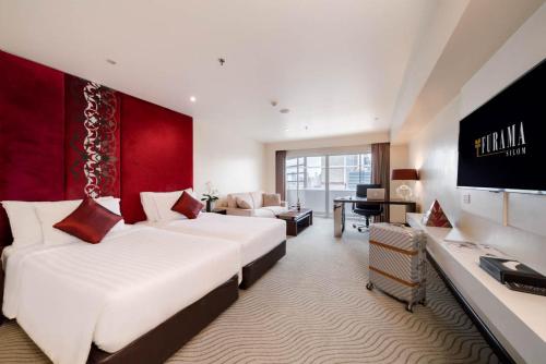 Habitación Doble Deluxe - 1 o 2 camas del hotel Furama Silom Bangkok. Foto 3