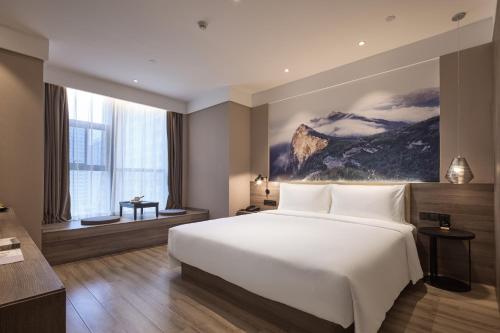 Habitación estándar con 1 cama king size del hotel Mercure Xi\'an Daming Palace. Foto 6