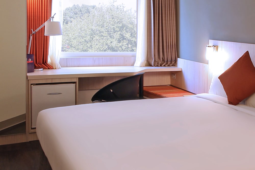 Habitación Business, 1 cama de matrimonio grande (Ibusiness) del hotel Ibis Auckland Ellerslie. Foto 1