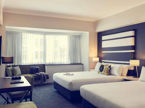 Habitación Doble Superior con 2 camas grandes del hotel Mövenpick Auckland. Foto 1