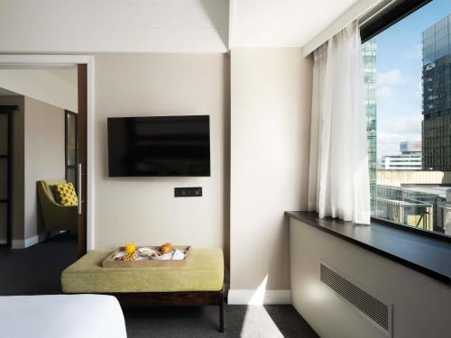 Suite Junior con cama extragrande - No fumadores del hotel Mövenpick Auckland. Foto 1
