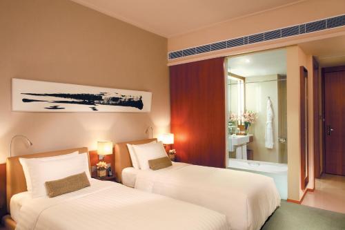 Habitación superior con 2 camas individuales del hotel Novotel Citygate Hong Kong