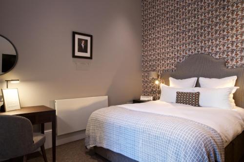 Habitación Doble Deluxe del hotel 54 Queens Gate. Foto 1