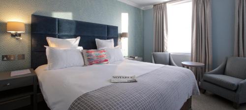 Habitación Doble Deluxe del hotel 54 Queens Gate. Foto 2