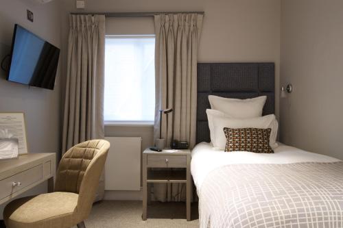 Habitación Individual Clásica del hotel 54 Queens Gate. Foto 2