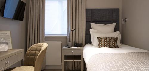 Habitación Individual Clásica del hotel 54 Queens Gate. Foto 6