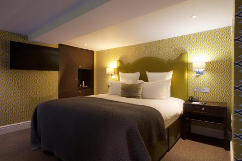 Suite Deluxe con cama extragrande del hotel 54 Queens Gate. Foto 15