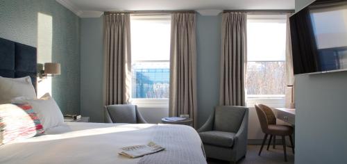 Habitación Doble Deluxe del hotel 54 Queens Gate. Foto 5