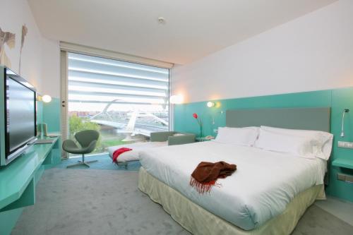 Habitación doble Vista Rio 1 Cama queen Futón japonés del hotel Hiberus. Foto 5
