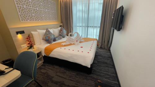 Habitación Estándar Bong Soo con 1 cama grande del hotel Santa Grand Signature Kuala Lumpur. Foto 2