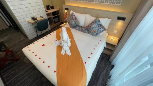 Habitación Estándar Bong Soo con 1 cama grande del hotel Santa Grand Signature Kuala Lumpur. Foto 3