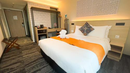 Habitación Superior Bong Soo con 1 cama grande del hotel Santa Grand Signature Kuala Lumpur. Foto 2