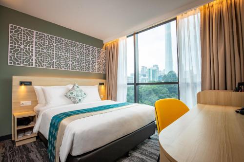 Habitación Deluxe Bong Soo con 1 cama grande del hotel Santa Grand Signature Kuala Lumpur