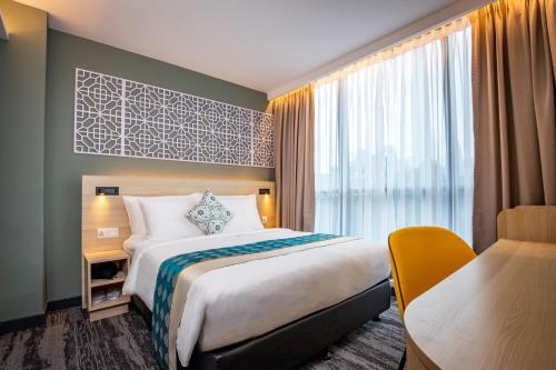 Habitación Deluxe Bong Soo con 1 cama grande del hotel Santa Grand Signature Kuala Lumpur. Foto 3