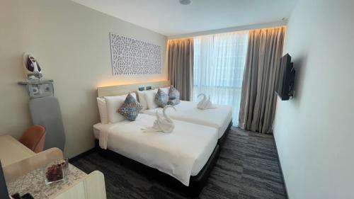 Habitación Bong Soo Tiga del hotel Santa Grand Signature Kuala Lumpur. Foto 2