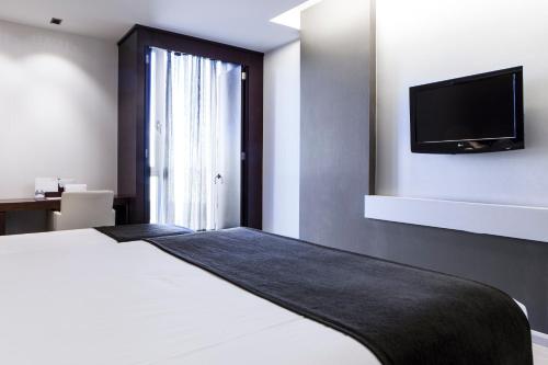 Habitación Triple del hotel Diagonal Plaza. Foto 1