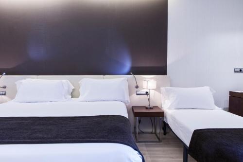 Habitación Triple del hotel Diagonal Plaza. Foto 4