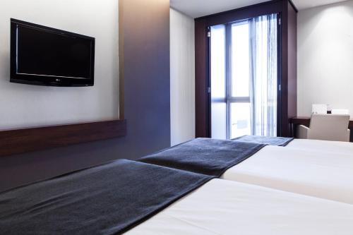 Habitación Quíntuple del hotel Diagonal Plaza. Foto 2