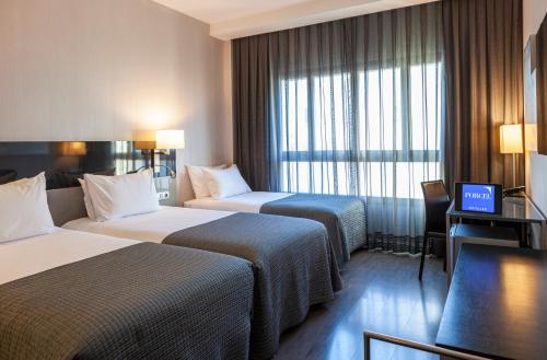 Habitación Triple del hotel Porcel Torneo. Foto 5