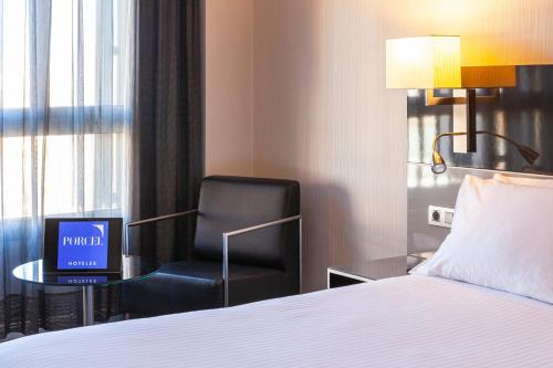 Habitación Triple del hotel Porcel Torneo. Foto 7