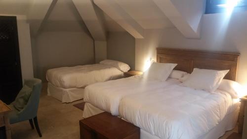 Habitación Triple del hotel Palacio De Mengibar. Foto 1