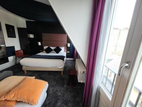 Habitación Familiar Estándar del hotel Accueil - Paris Pigalle MontmartreI. Foto 1