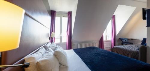 Habitación Familiar Estándar del hotel Accueil - Paris Pigalle MontmartreI. Foto 3