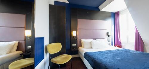Habitación Familiar Estándar del hotel Accueil - Paris Pigalle MontmartreI. Foto 7