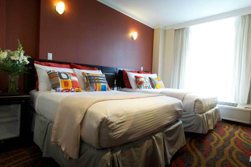 Habitación Doble adaptada para personas con movilidad reducida del hotel Nesva - New York City Vista. Foto 4