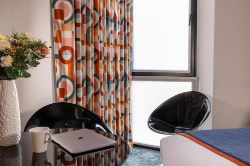 Habitación Doble / 2 camas Premium del hotel 7 Eiffel By Malone. Foto 2