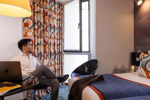 Habitación Doble / 2 camas Premium del hotel 7 Eiffel By Malone. Foto 3