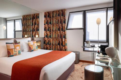 Habitación Doble Clásica del hotel 7 Eiffel By Malone. Foto 1