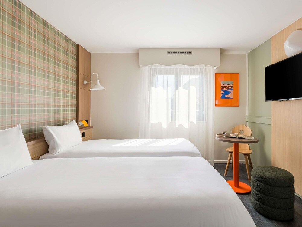 Habitación Standard con dos camas individuales del hotel Ibis Styles Annecy Gare Centre. Foto 4