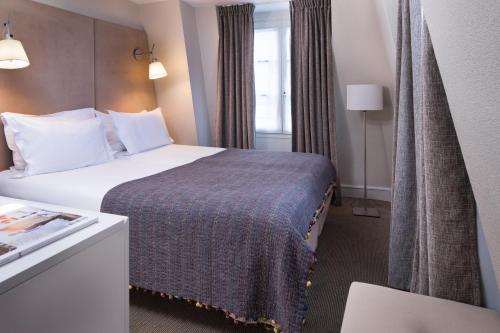 Habitación Triple del hotel D'espagne